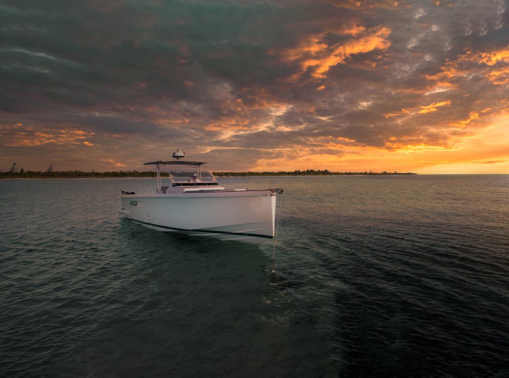 Private boat on the water at golden hour