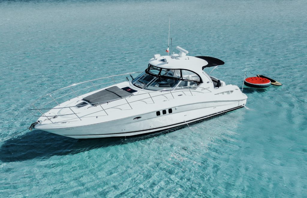 Sea Ray 40 cruising over turquoise water