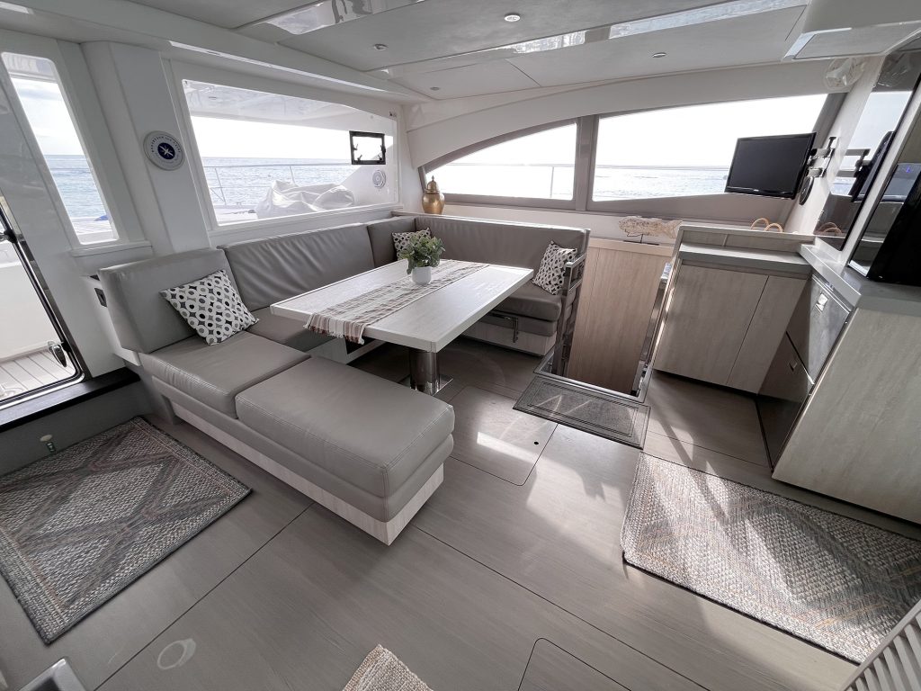 Spacious air-conditioned salon on a catamaran