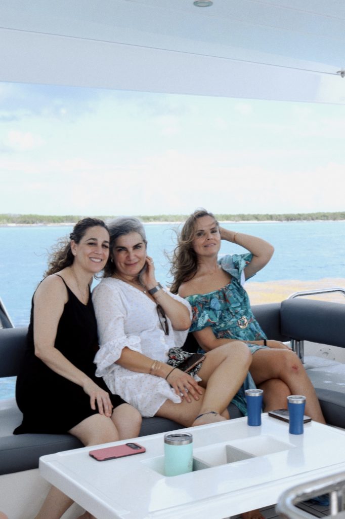 Three friends relaxing on the boat