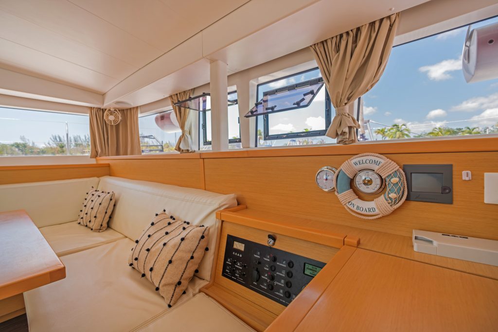 Warm wood salon of a sailing catamaran