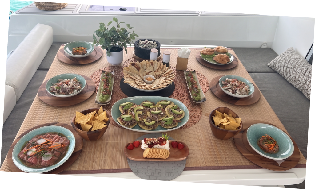 A full lunch spread set on deck