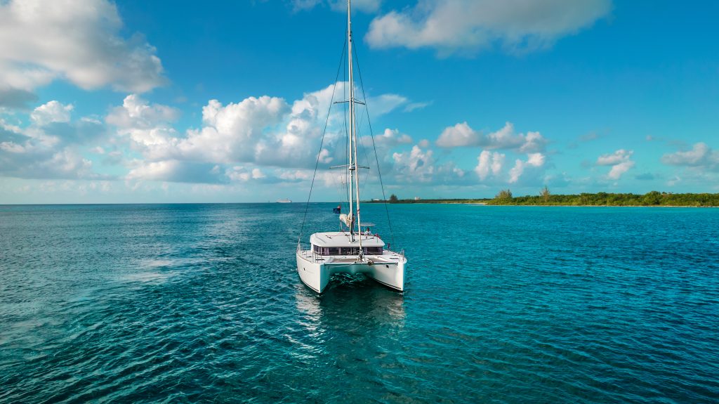 Sailing catamaran in the clear Caribbean