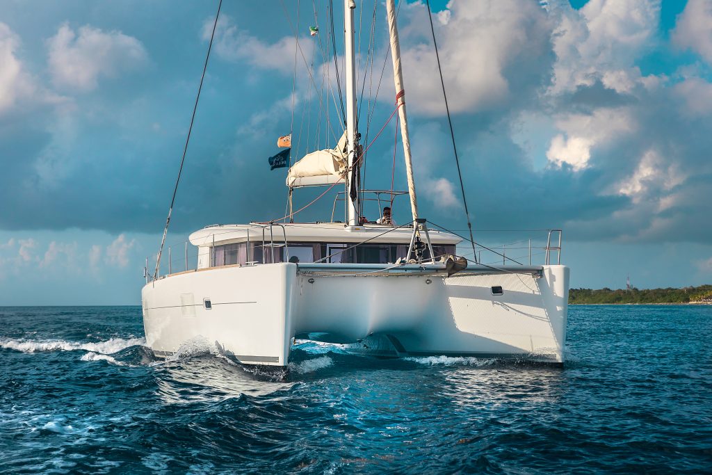 Lagoon catamaran with sails ready