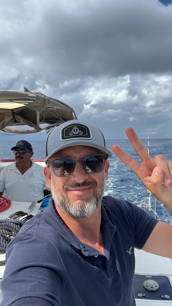 Our captain greeting guests with a smile