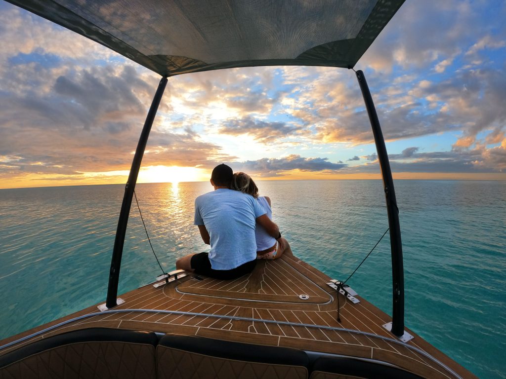 Watching the sunset from the bow of the boat