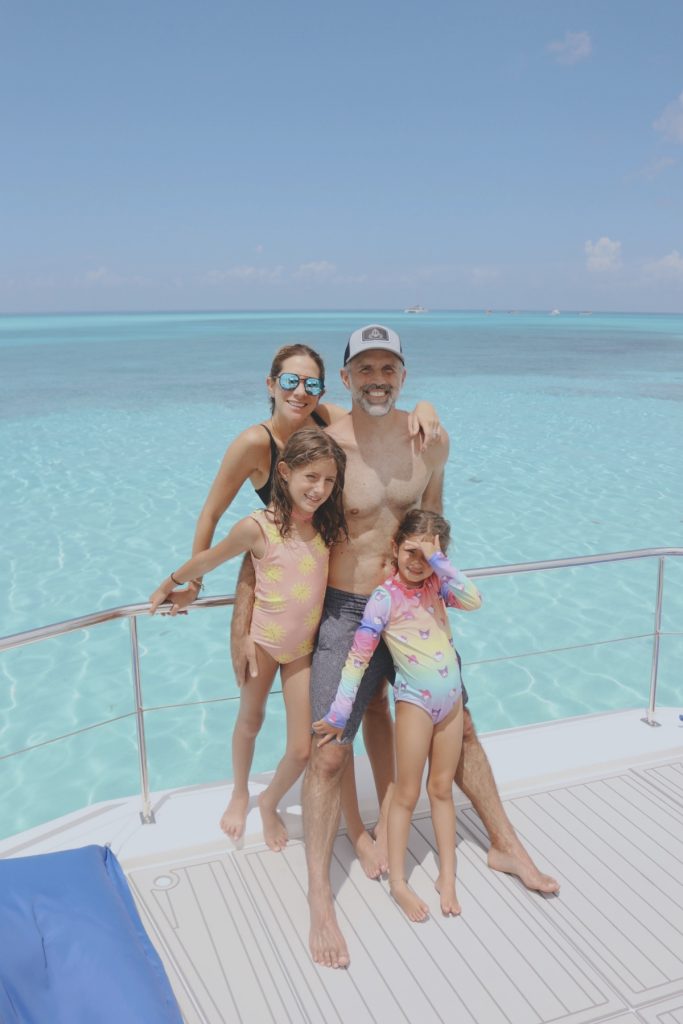 Family smiling on the bow
