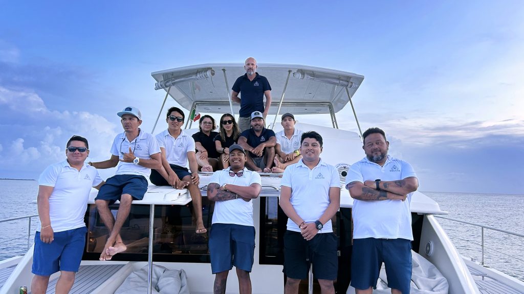 The Deluxe crew and guests on board
