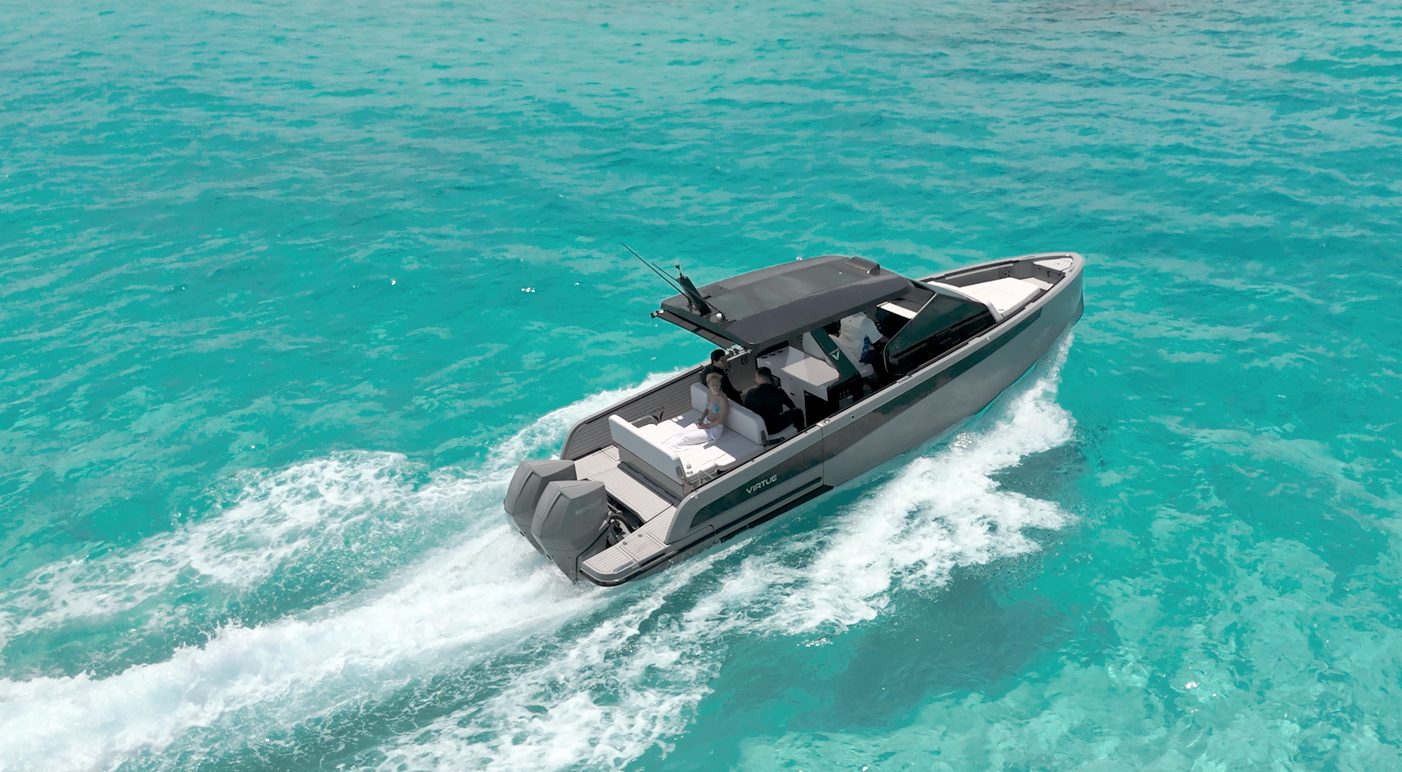 Aerial view of the Virtue 32 speeding across Cozumel waters